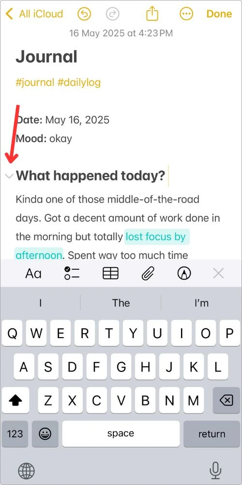 Apple Notes on iPhone showing a collapsible section with a down arrow next to the heading